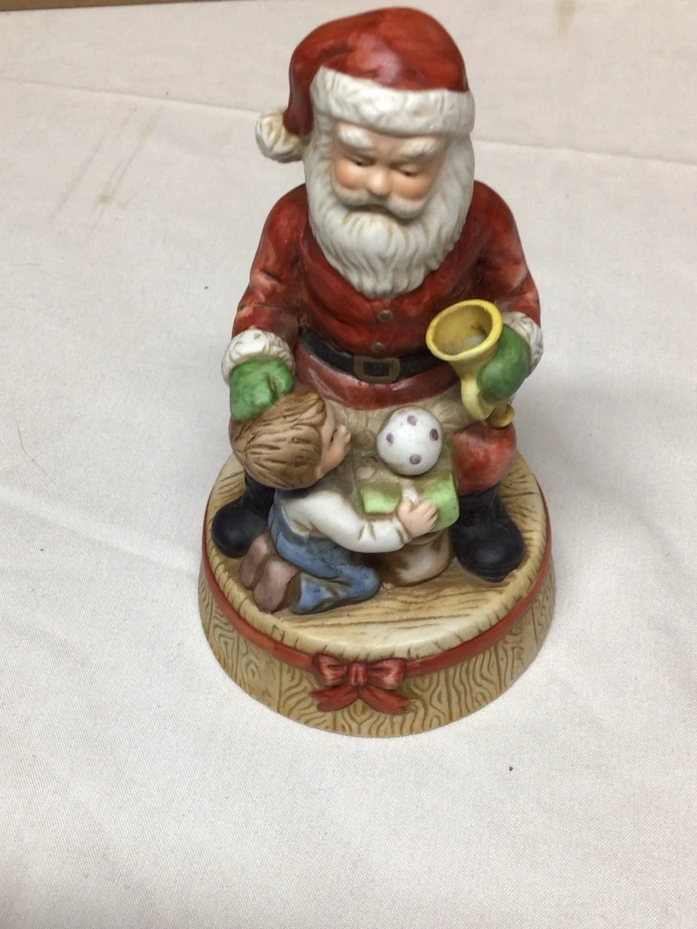 Santa Figurine Holiday Decoration in Red and White music box